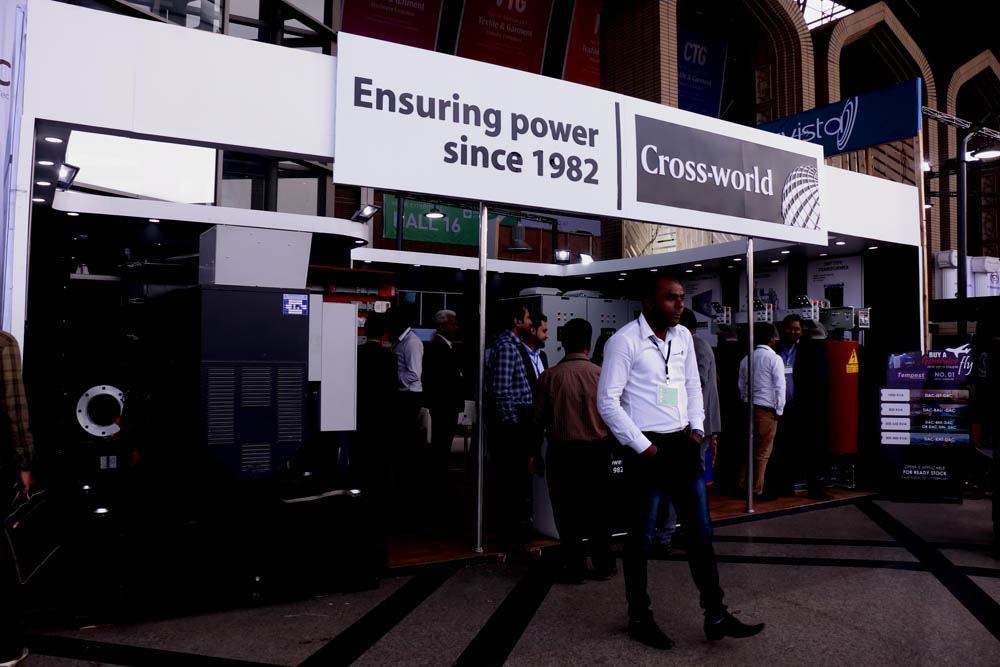 Cross-world power equipment exhibition stand with backlit fascia signage