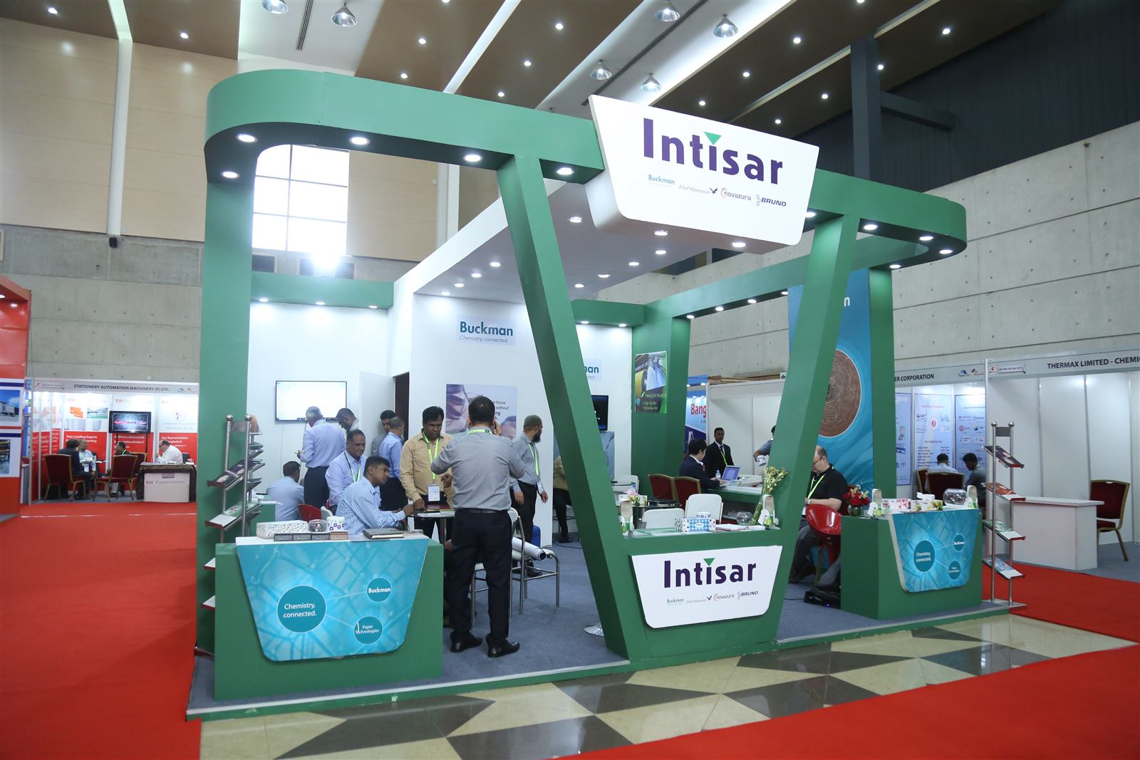 Intisar exhibition stand with open structural archway framing